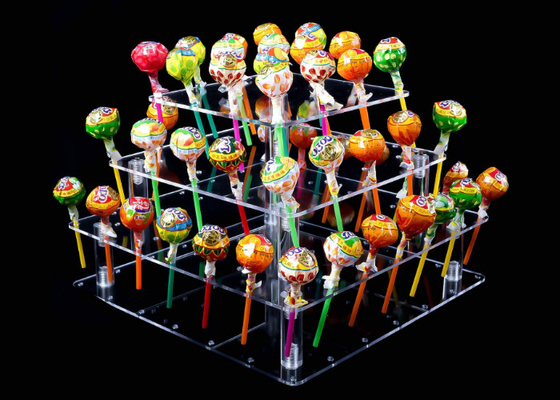 有毒物質は4つの層の明確なアクリルのケーキの立場56の穴のロリポップのケーキのホールダーを放します