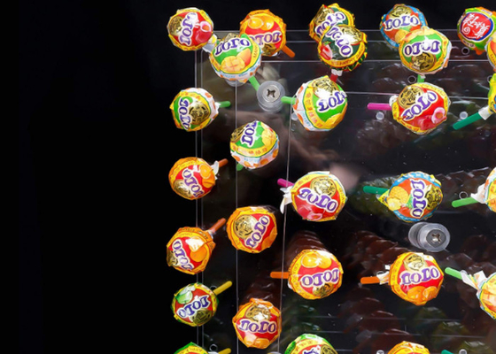 有毒物質は4つの層の明確なアクリルのケーキの立場56の穴のロリポップのケーキのホールダーを放します